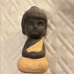 Black and Tan Buddha Figurine